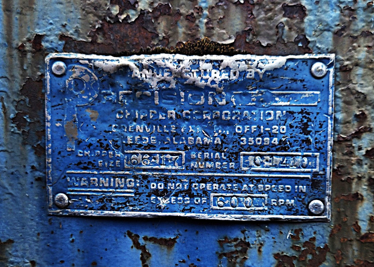 Chipper Corporation manufacturer data plate showing Size 66-11, Serial C-1410, and 600 RPM max limit.