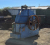 Fully assembled Precision 66-11 disc chipper showing the upper housing, pulley, and feed inlet opening.