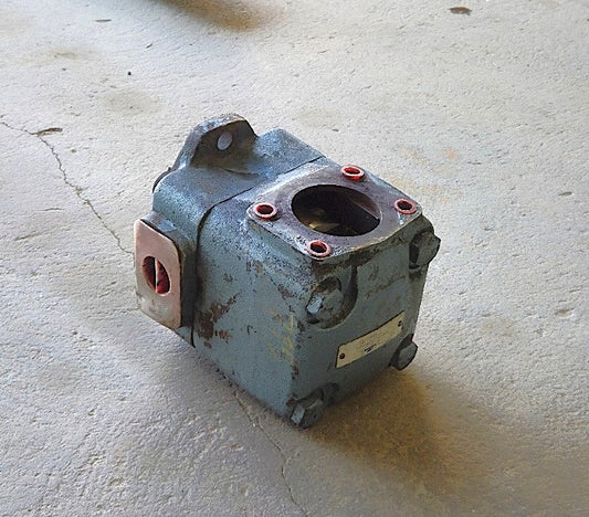 Angled view of the blue cast iron Metaris hydraulic vane pump showing the SAE 4-bolt port with red seal rings and heavy-duty housing