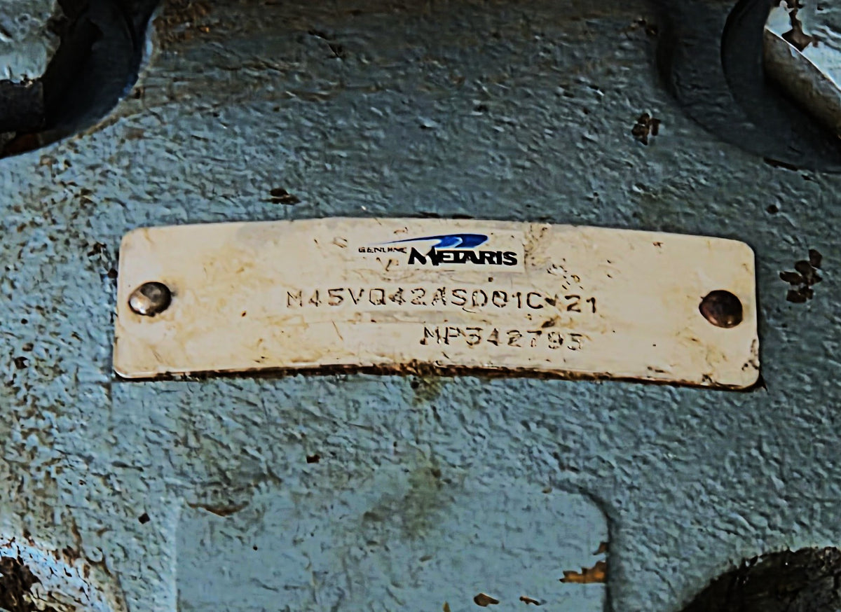 Manufacturer data plate secured to the blue casing reading Genuine Metaris, M45VQ42ASD01C-21, and MP342795.   