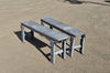 Opposite three-quarter angle displaying the galvanized steel roller beds, gray painted frames, and H-style support legs