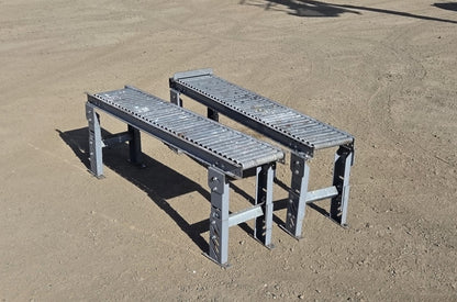 Opposite three-quarter angle displaying the galvanized steel roller beds, gray painted frames, and H-style support legs