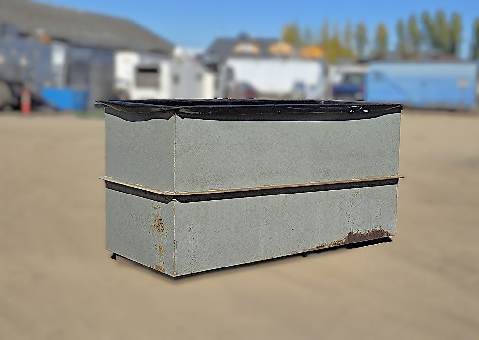  Front three-quarter view of the gray rectangular welded steel open-top tank showing the mid-height reinforcement rib and black overlapping top liner lip.
