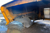 View beneath driver's side of Freightliner hood