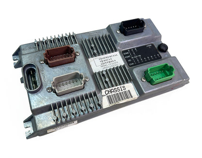 Angled view of Circle Automation CV-CCM-D heavy-duty truck chassis module showing pin connectors and cast cooling fins.