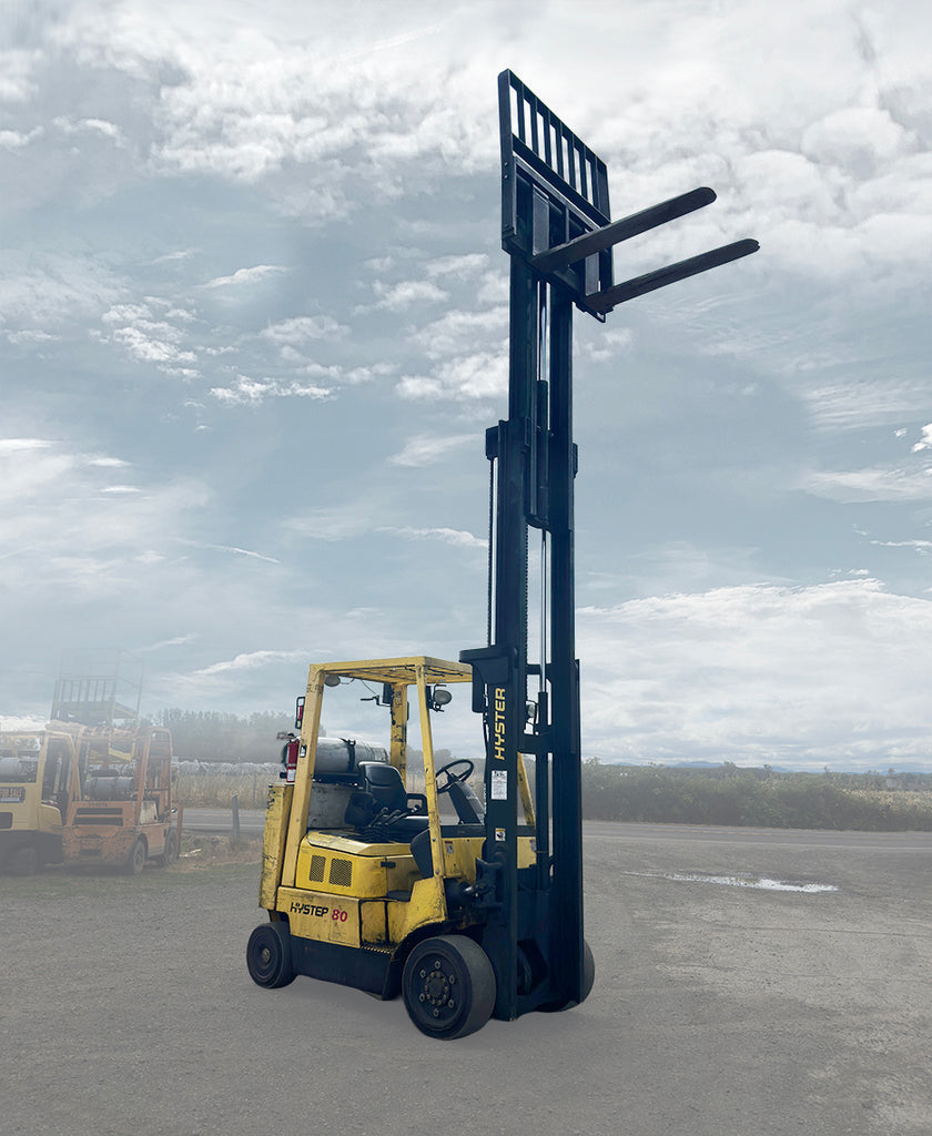 Hyster S80XM-BCS 8000 lb LP gas cushion tire forklift left exterior profile fully extended 2-stage mast.