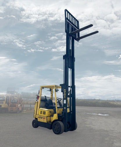 Hyster S80XM-BCS 8000 lb LP gas cushion tire forklift left exterior profile fully extended 2-stage mast.