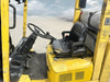 Hyster S80XM-BCS 8000 lb LP gas cushion tire forklift operator cabin torn seat steering wheel hydraulic controls.