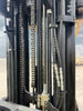 Hyster S80XM-BCS 8000 lb LP gas cushion tire forklift mast carriage hydraulic hose routing and chain mechanism.