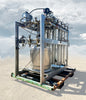 Front Left View]: Andonian Cryogenics HP-40 cryogenic pump and vaporizer skid front left showing top manifold gauges and control box.