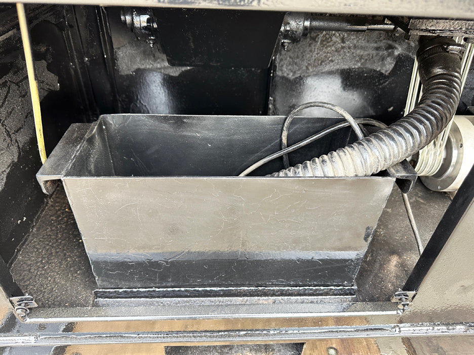 Abrasive Finishing Inc SuperQuiet Burr Bench vibratory tumbler internal lower compartment black rectangular catch bin and corrugated drainage hose