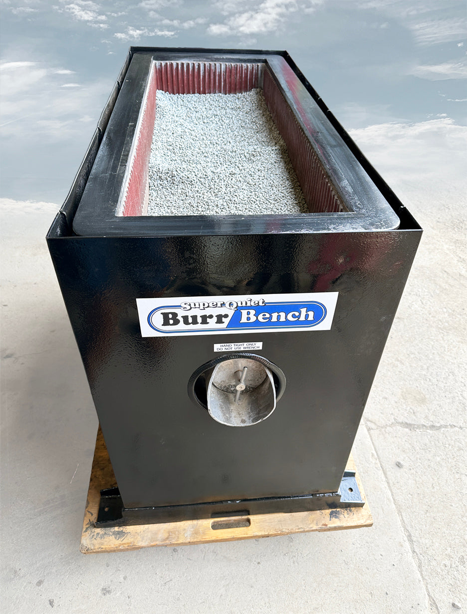 Abrasive Finishing Inc SuperQuiet Burr Bench vibratory tumbler top down view open tub showing red ribbed lining and grey ceramic tumbling media