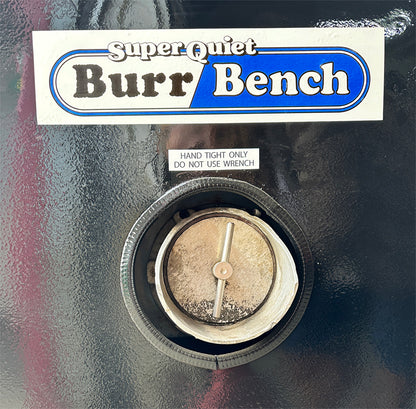 Abrasive Finishing Inc SuperQuiet Burr Bench vibratory tumbler front circular discharge port cover handle and manufacturer branding decal