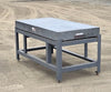 Straight-on side view of the Mojave granite surface plate and stand.